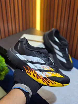 Adidas Adizero EvoBlack and White With a Flame Graphic Pattern