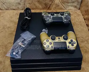 PS4 Pro With 12 Games, 2pads. Wake Up Your Inner Champion.