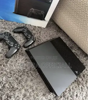 PS4 Standard With 12 Games, 2pads. A Better Deal Than the Club.