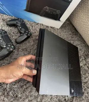 PS4 Standard With 12 Games, 2pads. The Ultimate Kampala Cure.
