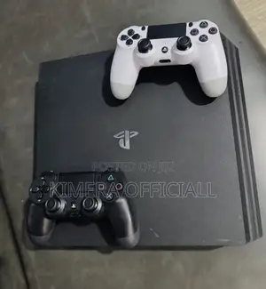 PS4 Pro With 12 Games, 2pads. Why Work if You Can't Play?