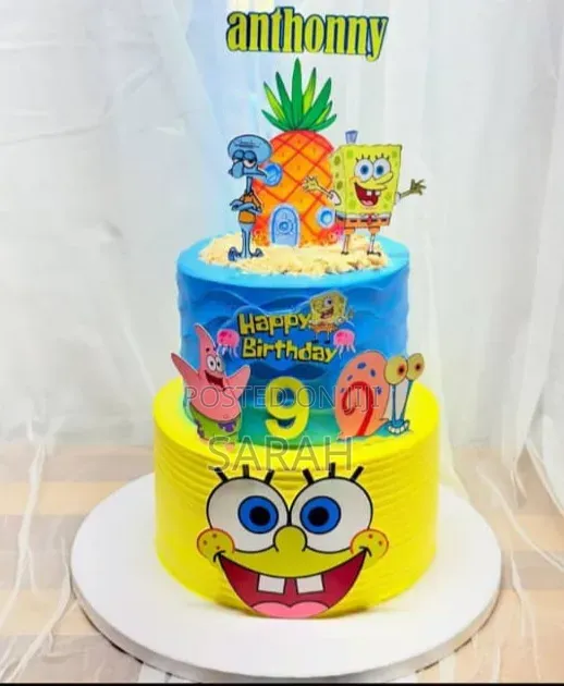 Vibrant Two-Tier SpongeBob SquarePants Birthday Cake.