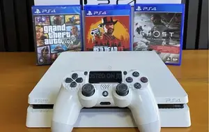 . PS4 Slim With 12 Games, 2pads. The Best in the Whole Land.