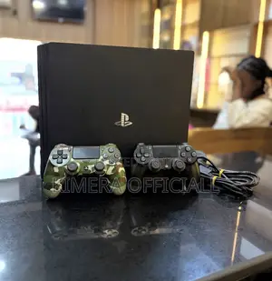 PS4 Slim With 12 Games, 2pads. Real Vibes for a Real Ugandan.