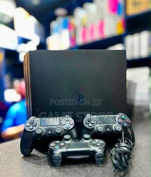 PS4 PRO WITH 12 GAMES AND 2 PADS Save Your Rent Money From Babes
