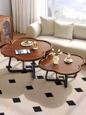 2-Piece Nesting Coffee Table Set Features a Walnut Wood Finish