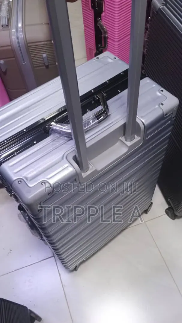 Medium Silver-Colored Luggage Suitcase