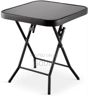 Folding Side Table Features a Steel Frame and a Tempered Glass Top.