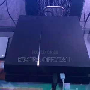 PS4 Standard With 12 Games, 2pads. A Better Deal Than the Market.