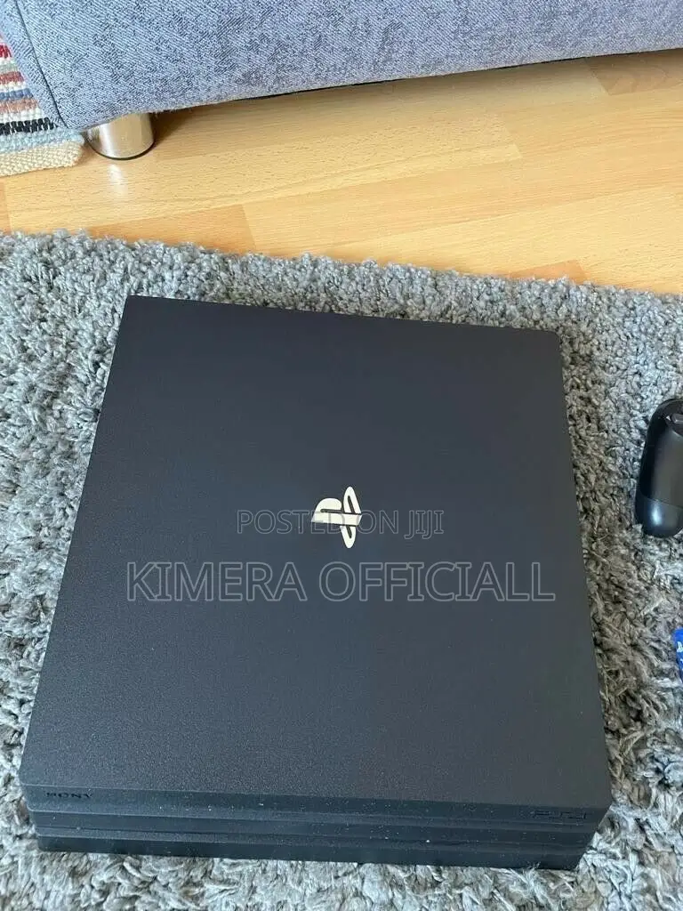 PS4 Pro With 12 Games, 2pads. Keep the Kids Busy, My Friend.