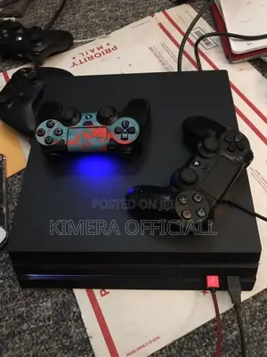 PS4 Pro With 12 Games, 2pads. Make Your Ex Jealous Today.