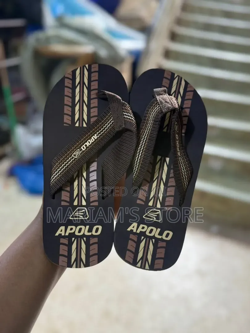 Flip Flops Feature a Navy Blue Base With Grey and Beige Woven Straps