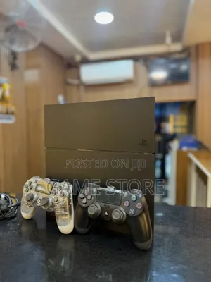 PS4 Fat WITH 12 GAMES AND 2 PADS Better Than a Table at Guvnor