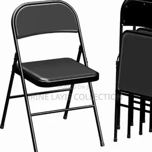 Folding Chair Featuring a Padded Vinyl Seat .