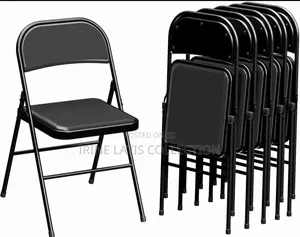 Folding Chair Featuring a Padded Vinyl Seat .