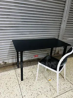 Wooden Reading Table With a Plastic Chair