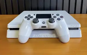 PS4 Slim With 12 Games, 2pads. Smoother Than the Entebbe Highway.