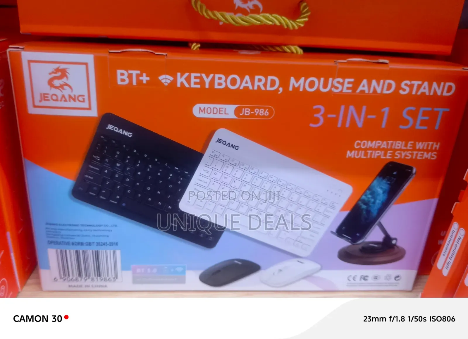 3-in-1 Set Featuring a Wireless Keyboard, Mouse, and Phone Stand.