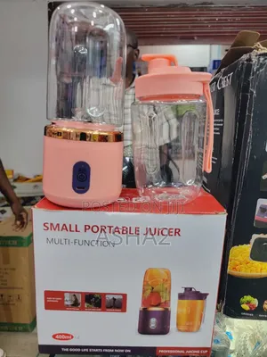 Hand Juicer Wither a Glass Bottle