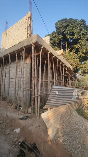 Flat Commercial Building on Sale Uncompleted Located in Nansana