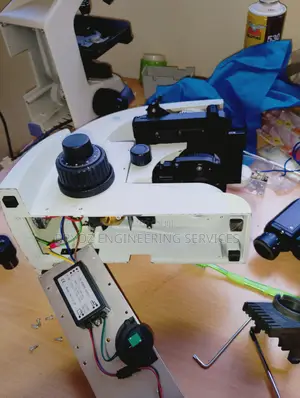 Repair and Service of All Microscopes
