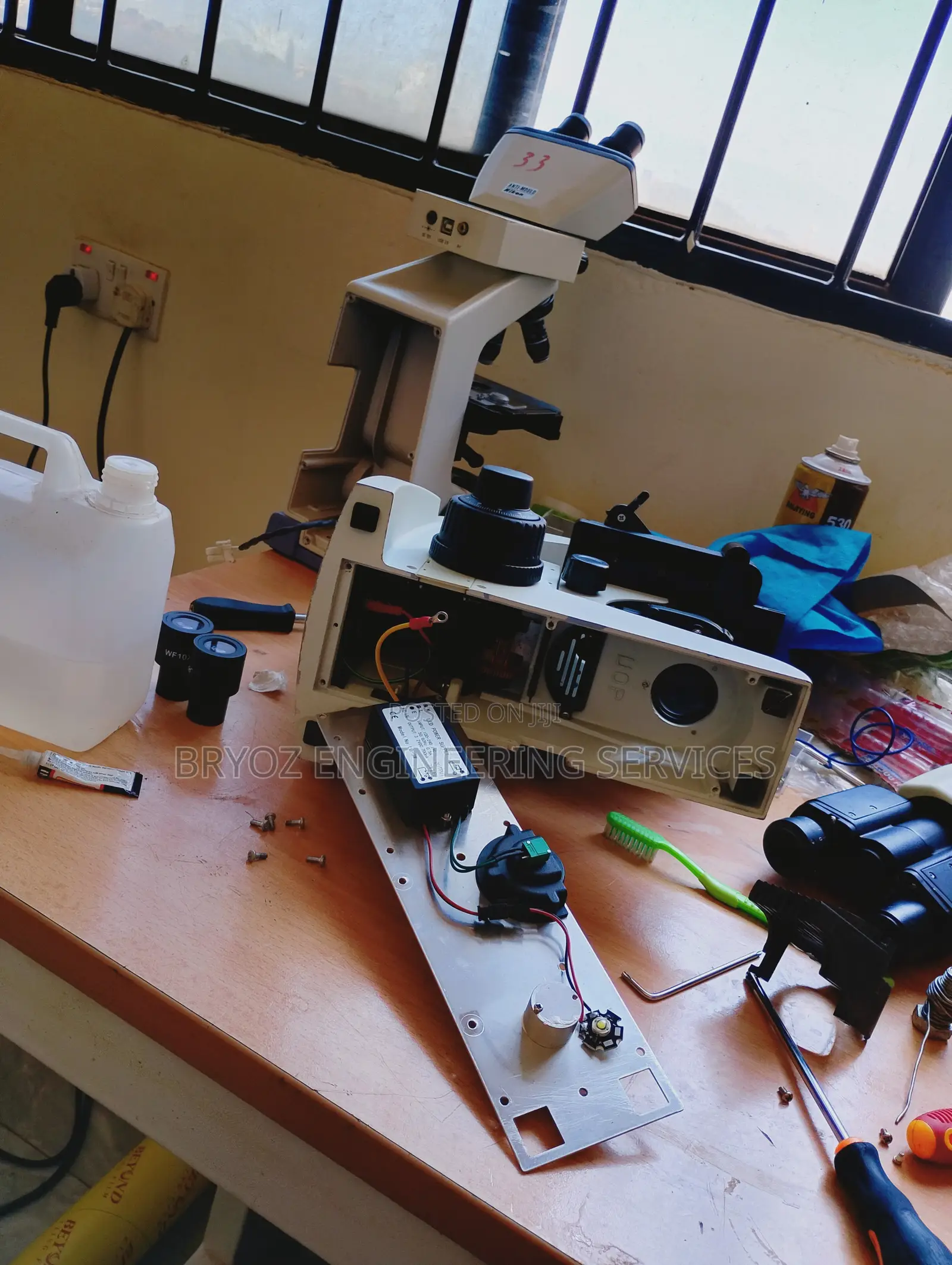 Repair and Service of All Microscopes