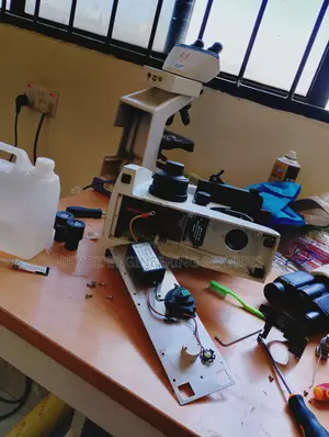 Repair and Service of All Microscopes
