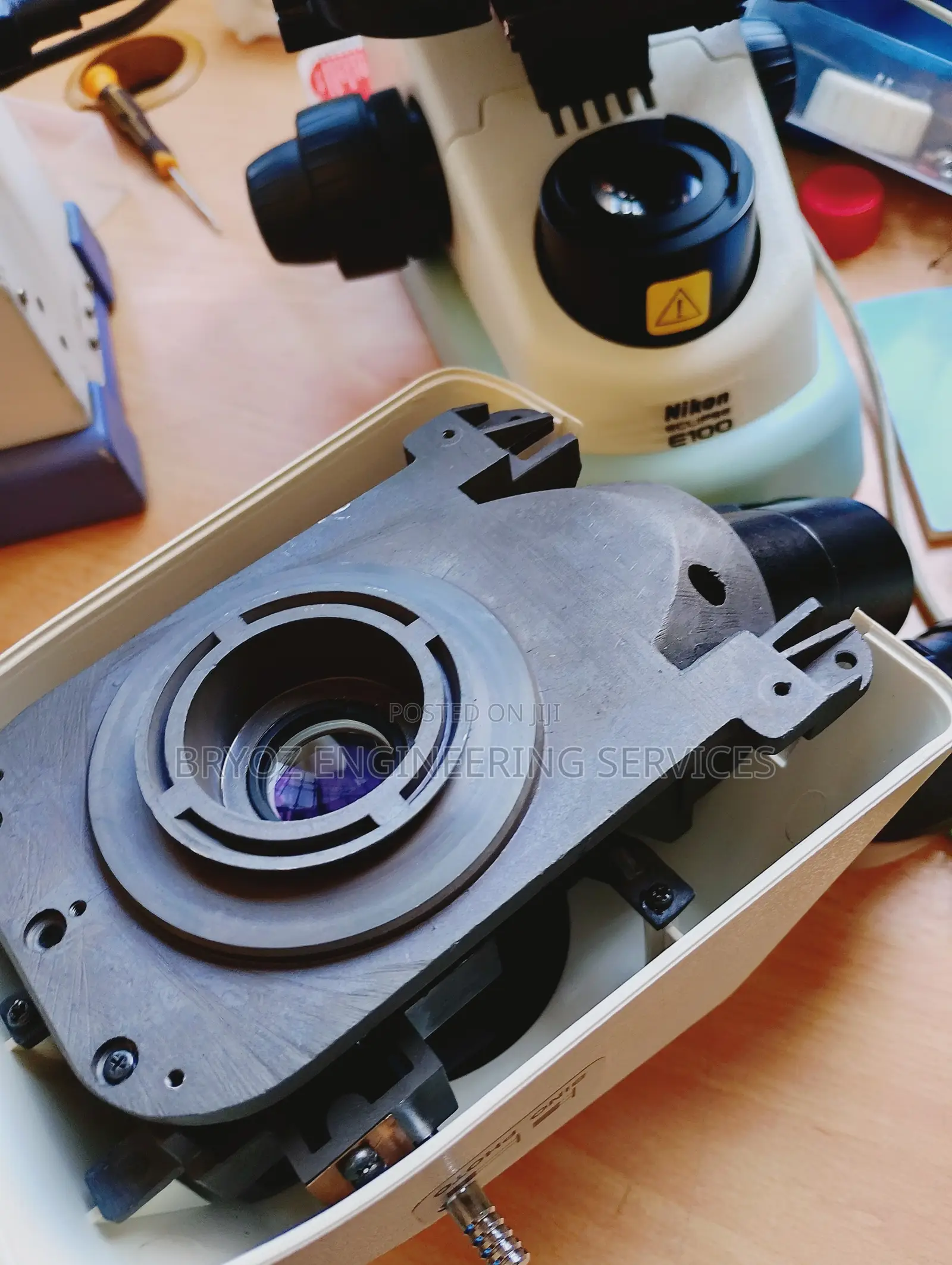 Repair and Service of All Microscopes