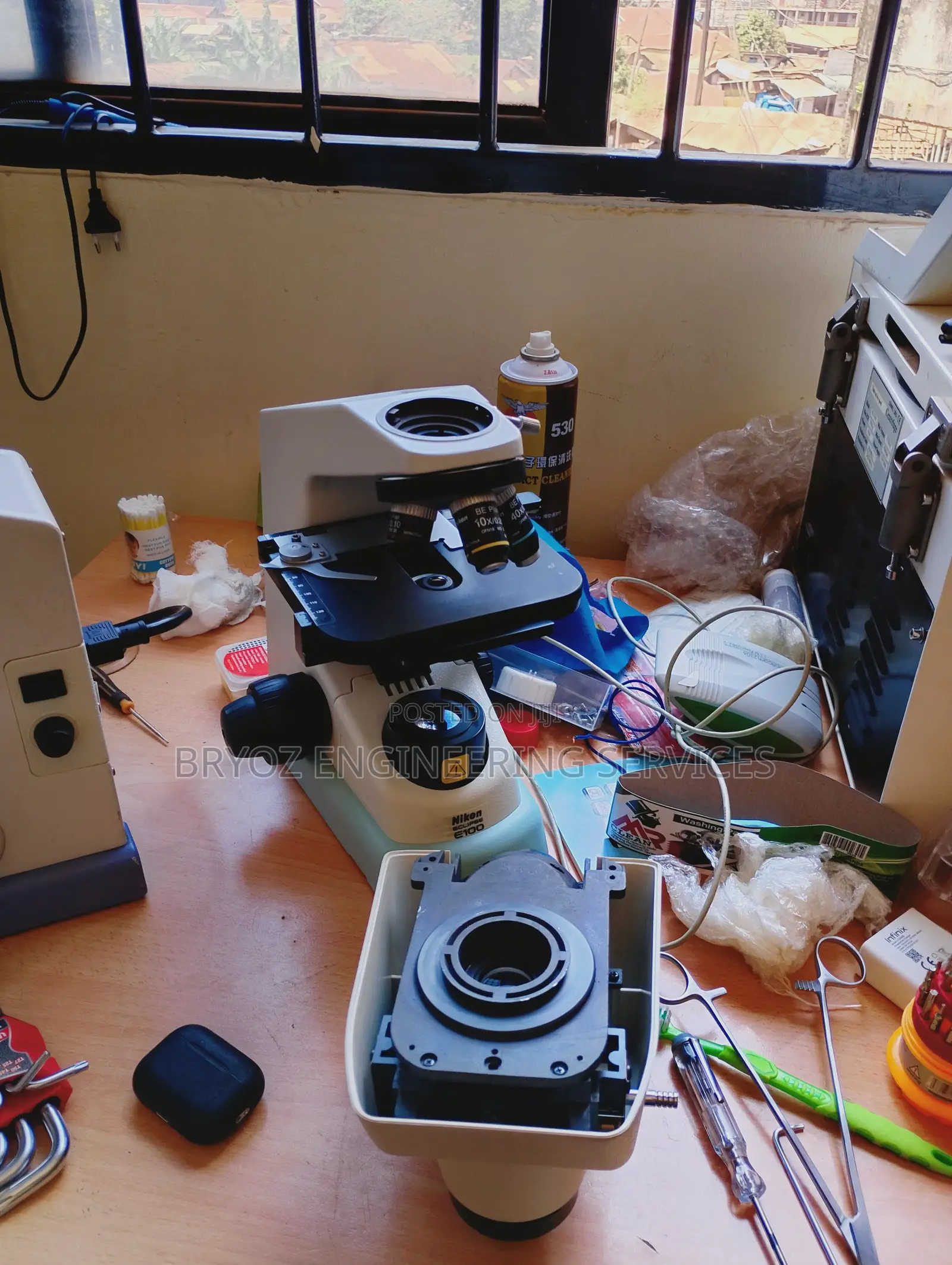 Repair and Service of All Microscopes
