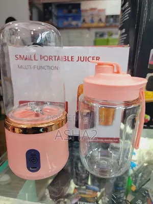 Hand Juicer Wither a Glass Bottle