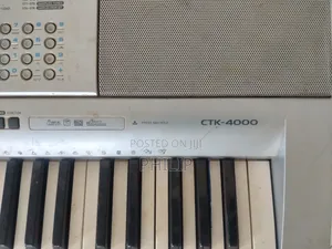 Used Casio CTK-4000 Keyboard With Stand –
