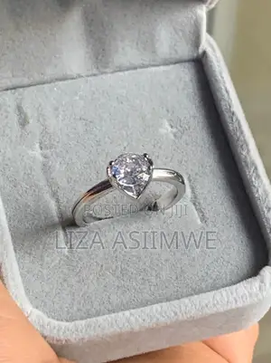 Heart-Shaped White Crystal Set in Stainless Steel Engagement Ring