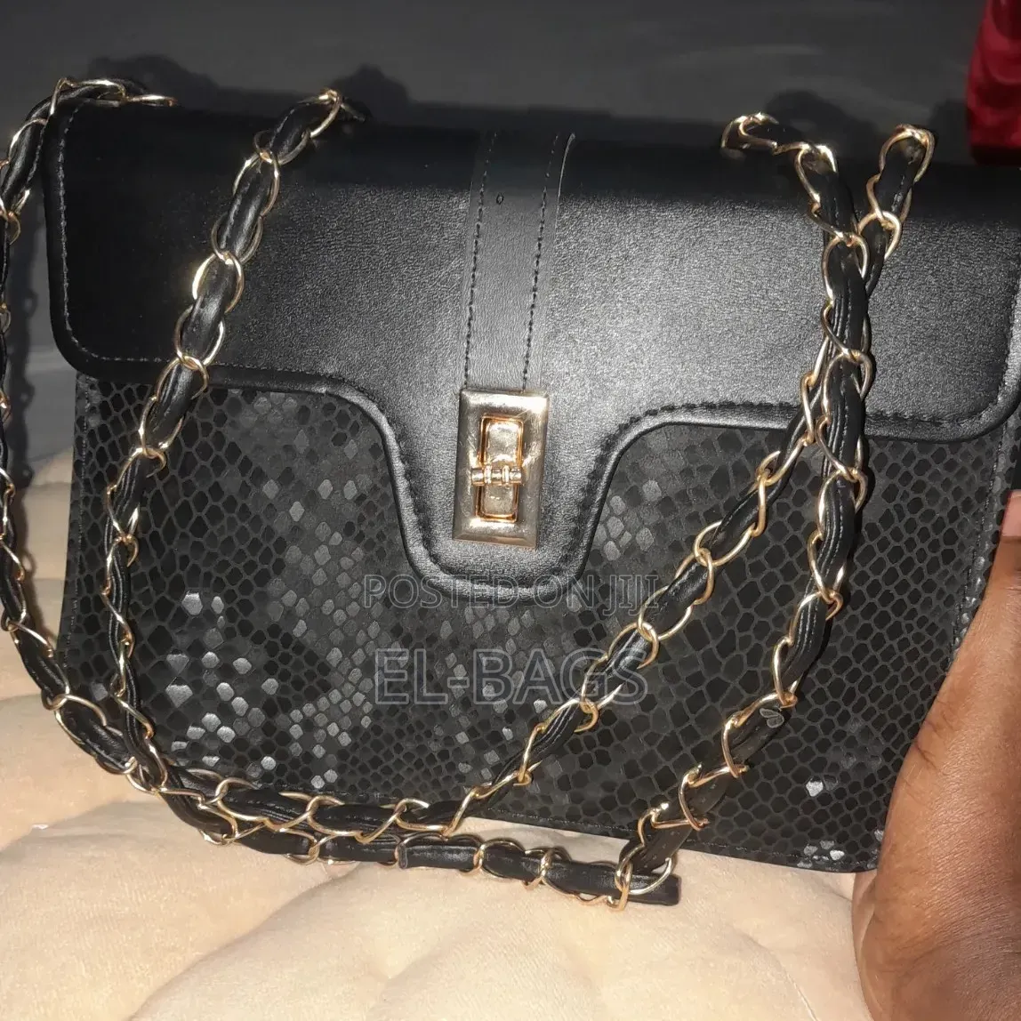 The Structured Black Python Shoulder Bag