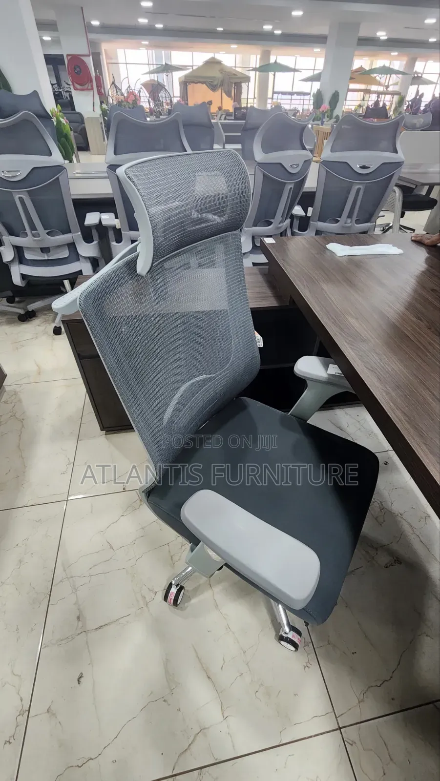 Gray Netted Office Chair With Headrest