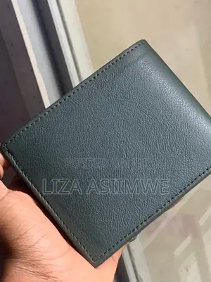 Calvin Klein Bi-Fold Wallet Featuring a Debossed Monogram Logo On