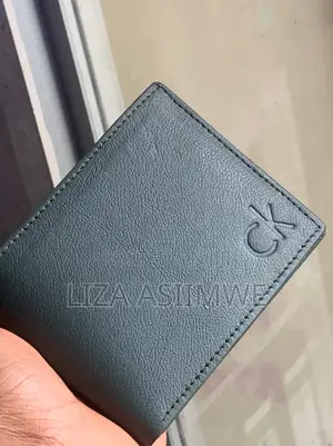 Calvin Klein Bi-Fold Wallet Featuring a Debossed Monogram Logo On