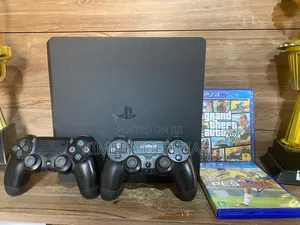 PS4 Slim With 12 Games, 2pads. No 'Buli Kintu' Issues Here.
