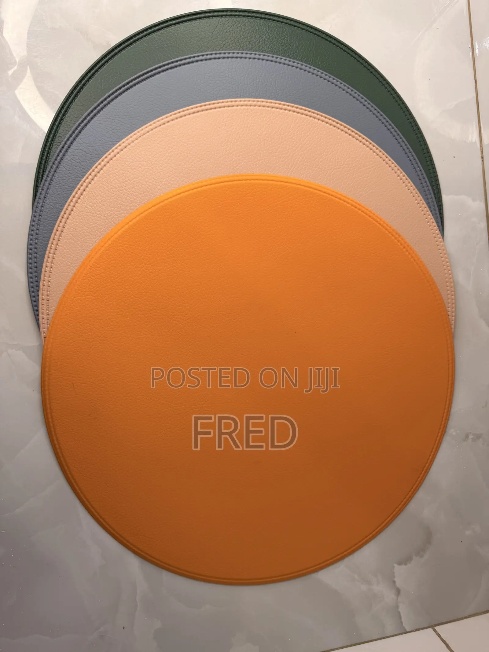 Round, Multicolored Faux Leather Placemats