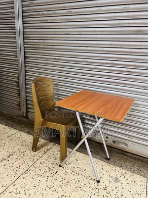 Cocktail Folding Wooden Table and a Plastic Chair