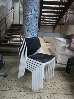 Stackable White and Black Plastic Chairs Plastic Chairs