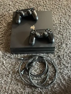 Sony PlayStation 4 Pro. PS4 Pro Chipped Unit + 32 Games 2 New Pads