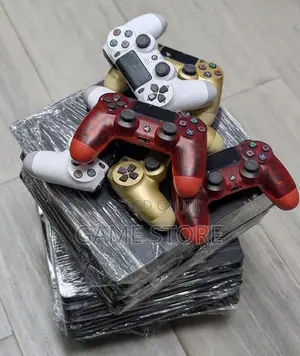 PS4 Fat Standard, 12 Games, 2 Pads, UGX, Near Watoto