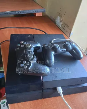 PS4 Fat Standard Chipped Bundle: 2Pads and 12 Games in Kampala Central