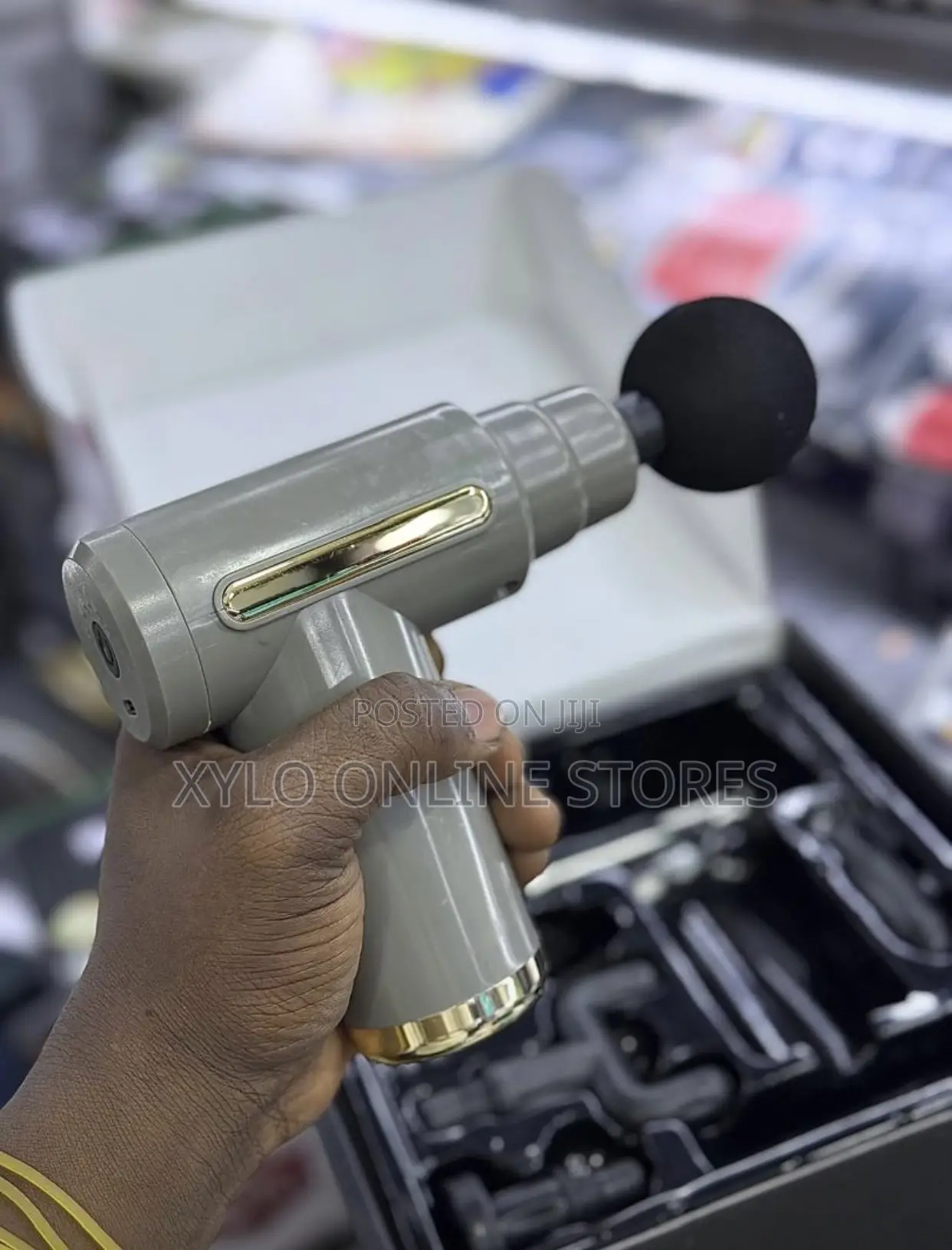 A Hand Held Rechargeable Massage Gun
