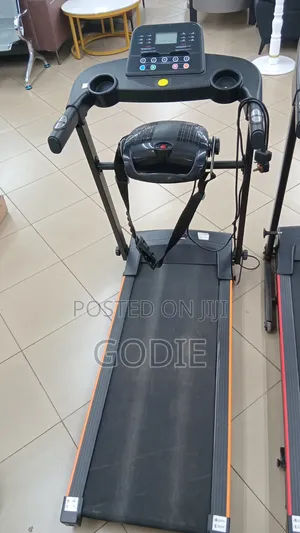 Foldable Electric Treadmill With Integrated Massage Belt .