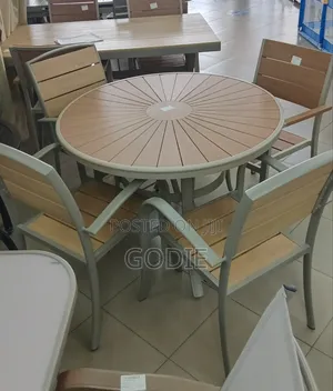 5-Piece Outdoor Patio Set With Wood-Look Top and Four Chairs.