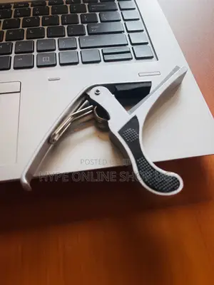 Brandnew Original Mixed Silver and Black Guitar Capo
