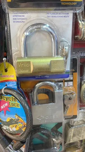 Heavy-Duty Brass-Finished Padlock With a Hardened Shackle.