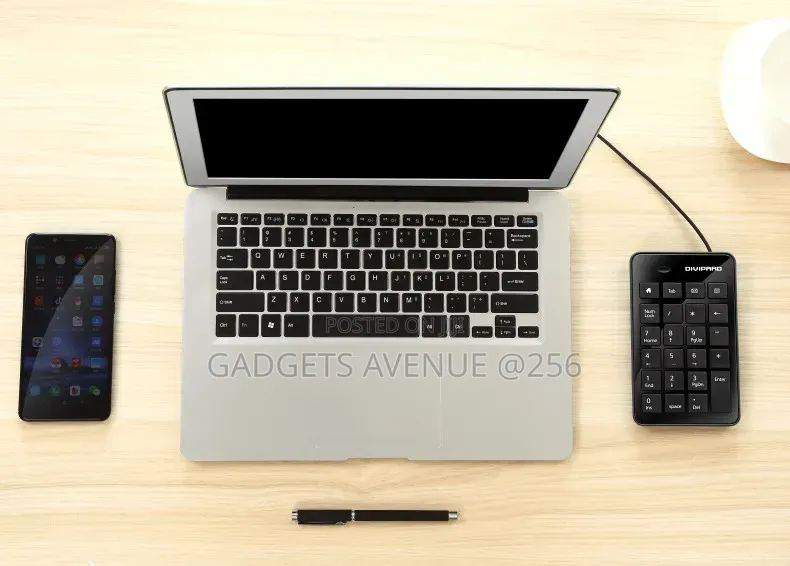 Numeric Keypad Featuring a Black Design and Four Office Hotkeys