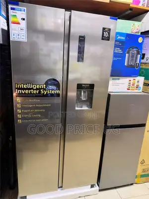 CHiQ Side-by-Side Refrigerator With Water Dispenser. 560